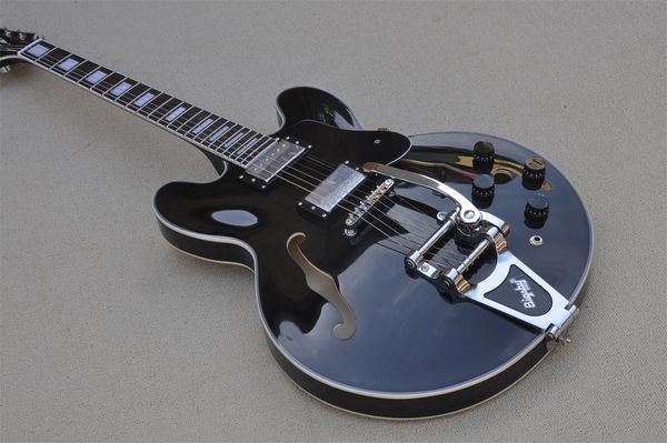 35 hollow black electric guitar white binding tremolo rocker fixed bridge black pickguard rosewood fingerboard 22 frets
35 hollow black electric guitar white binding tremolo rocker fixed bridge black pickguard rosewood fingerboard 22 frets