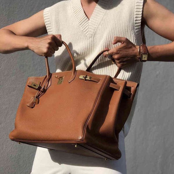 herme birkins women's manual bag litchi grain togo leather portable elephant grey 25 30cm have logo
herme birkins women's manual bag litchi grain togo leather portable elephant grey 25 30cm have logo