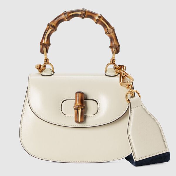 fashion women's bag new retro leather bamboo bag semi-circular handbag messenger bag niche design lock 17cm
fashion women's bag new retro leather bamboo bag semi-circular handbag messenger bag niche design lock 17cm