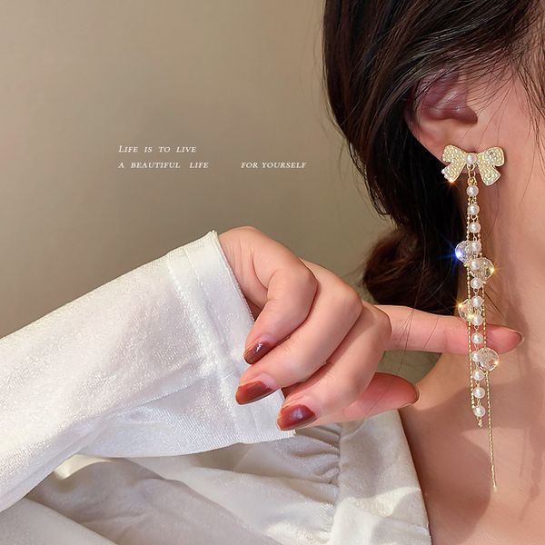 925 silver needle pearl crystal bow tassel earrings elegant long super fairy light luxury earrings high-grade eardrop, Golden
925 silver needle pearl crystal bow tassel earrings elegant long super fairy light luxury earrings high-grade eardrop, Golden