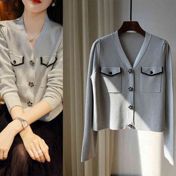 women's knits tees p185200 fg xiaoxiangfeng knitted v-neck single breasted cardigan sweater coat female yuan, White
women's knits tees p185200 fg xiaoxiangfeng knitted v-neck single breasted cardigan sweater coat female yuan, White