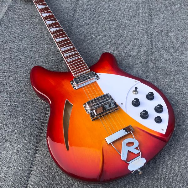factory direct sales ruiken 12-string electric guitar cherry red semicircle hollow body triangle pearl fingerboard inlay mother postage
factory direct sales ruiken 12-string electric guitar cherry red semicircle hollow body triangle pearl fingerboard inlay mother postage