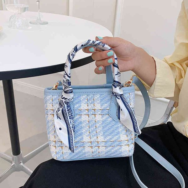2022 factory wholesale new leisure small bag cabbage basket checkered woolen korean silk scarf decorative portable one shoulder messenger ba
2022 factory wholesale new leisure small bag cabbage basket checkered woolen korean silk scarf decorative portable one shoulder messenger ba
