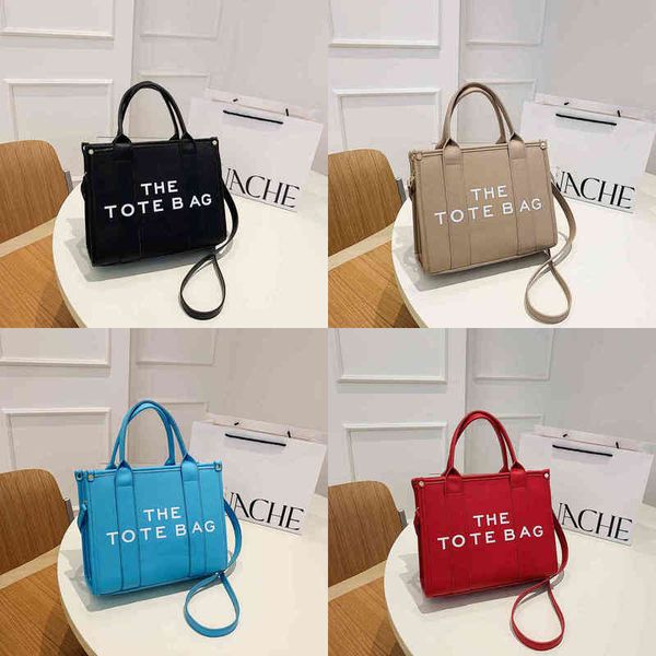 tote bag lychee pattern handbag women's portable shopping bag high sense fashion one shoulder messenger purse bag and hat 220511
tote bag lychee pattern handbag women's portable shopping bag high sense fashion one shoulder messenger purse bag and hat 220511