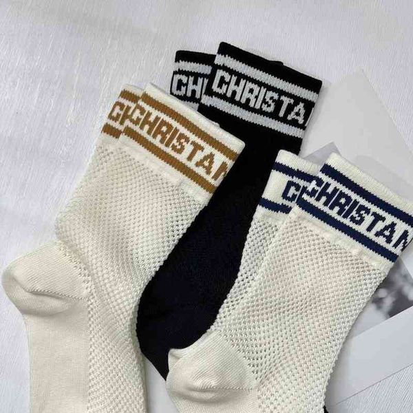 letter love classic brand calf socks fashion hosiery spring summer mesh hollowed hosierys designer middle tube sock d54j, Black;white
letter love classic brand calf socks fashion hosiery spring summer mesh hollowed hosierys designer middle tube sock d54j, Black;white