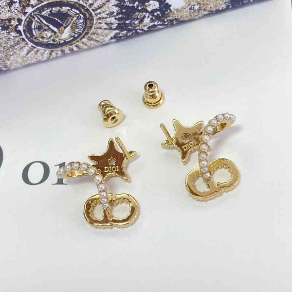 outlet letter surround star pearl earrings women's geometric earrings, Golden
outlet letter surround star pearl earrings women's geometric earrings, Golden