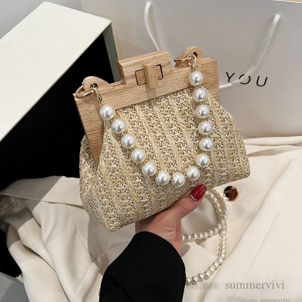 summer women grass weaving shell satchel ladies pearls chain handbags luxury lady single shoulder princess bag h0183
summer women grass weaving shell satchel ladies pearls chain handbags luxury lady single shoulder princess bag h0183