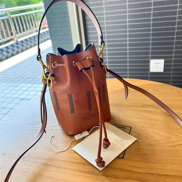 luxury designer mon bucket bag mogano panna zucca pattern brown leather drawstring shoulder bag perforated women
luxury designer mon bucket bag mogano panna zucca pattern brown leather drawstring shoulder bag perforated women