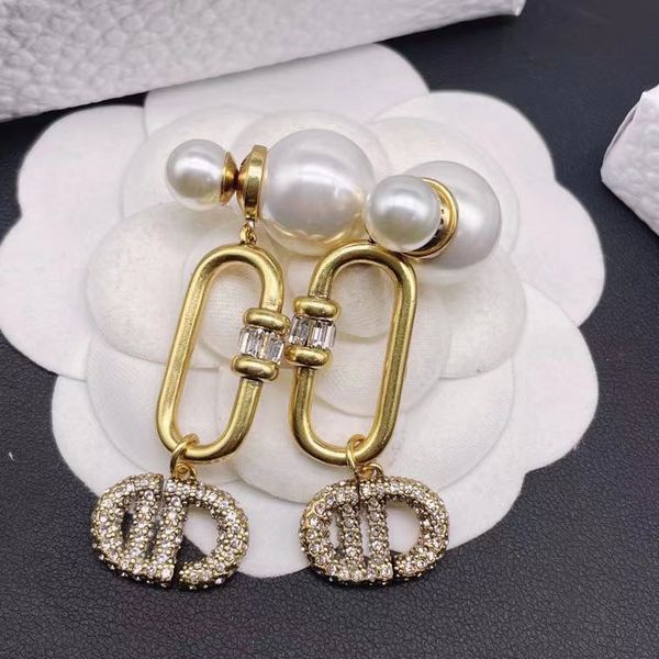 the factory directly d home gold cd letter earrings 2022 new dijia net red back hanging pearl earrings, Golden
the factory directly d home gold cd letter earrings 2022 new dijia net red back hanging pearl earrings, Golden