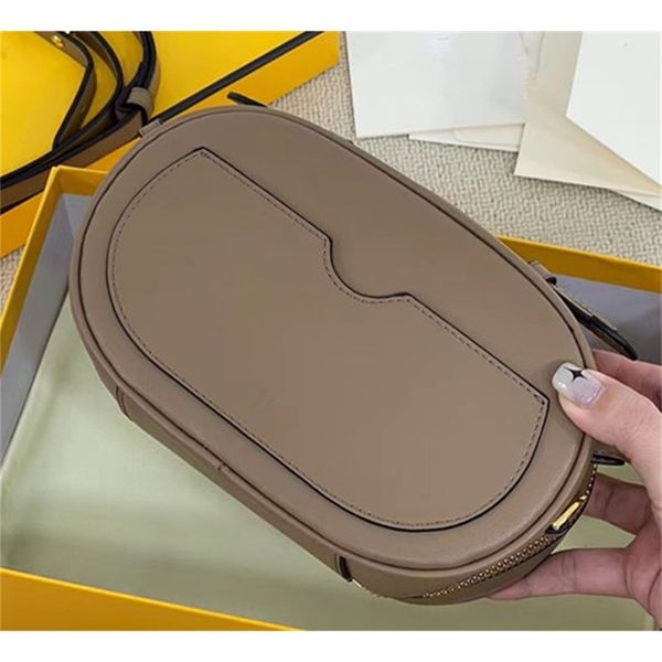 new fashion leather camera creative ladies oval portable one shoulder fashion messenger bag
new fashion leather camera creative ladies oval portable one shoulder fashion messenger bag