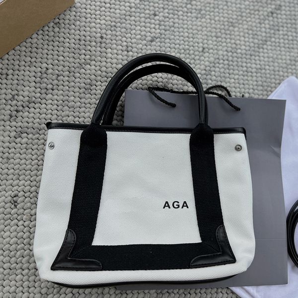 canvas tote bag women handbag shoulder crossbody bag internal coin purse black border leather corners retractable side detachable long strap
canvas tote bag women handbag shoulder crossbody bag internal coin purse black border leather corners retractable side detachable long strap