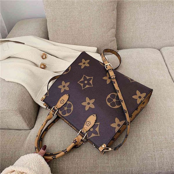 2022 factory wholesale new spring summer women's korean version versatile net red fashion one shoulder hand capacity large bag
2022 factory wholesale new spring summer women's korean version versatile net red fashion one shoulder hand capacity large bag