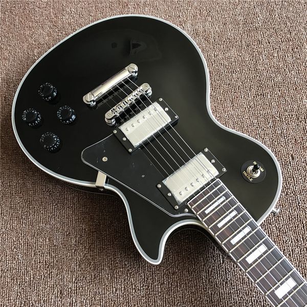 new black electric guitar with chrome hardware and rosewood fingerboard , fast shipping guitar
new black electric guitar with chrome hardware and rosewood fingerboard , fast shipping guitar