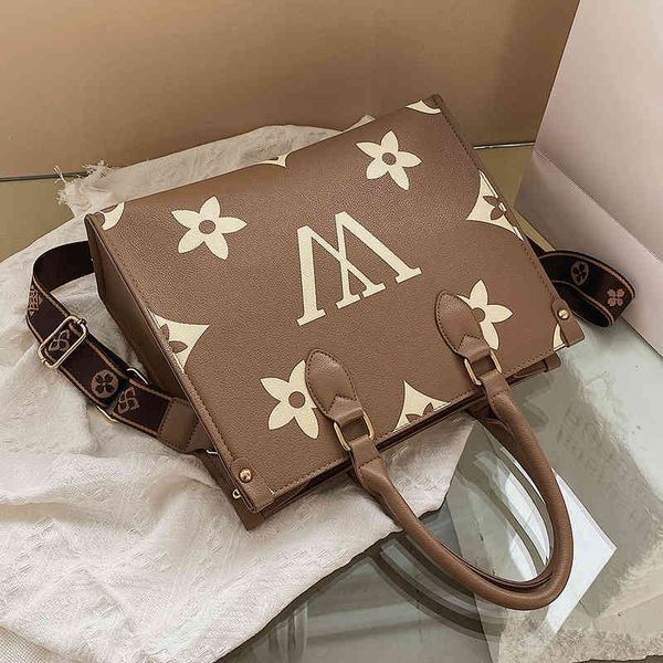 factory outlet women's new 2022 foreign style messenger shoulder bag large capacity fashion portable bag
factory outlet women's new 2022 foreign style messenger shoulder bag large capacity fashion portable bag