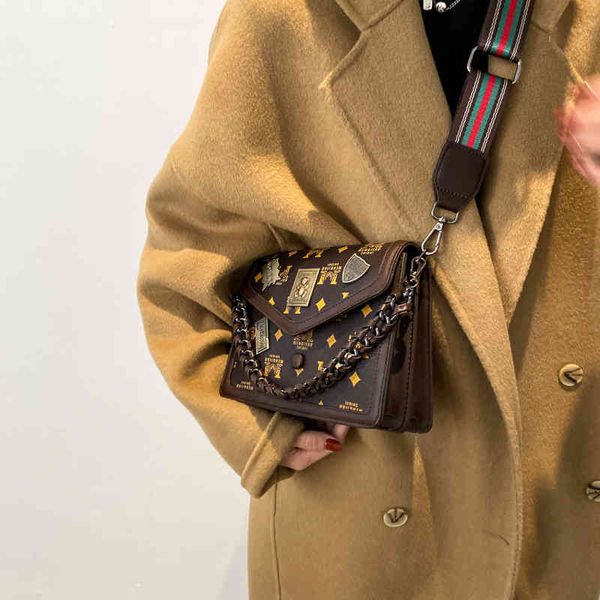 purses outlet bag women's new messenger sling one letter wide shoulder belt trend small square bag women
purses outlet bag women's new messenger sling one letter wide shoulder belt trend small square bag women