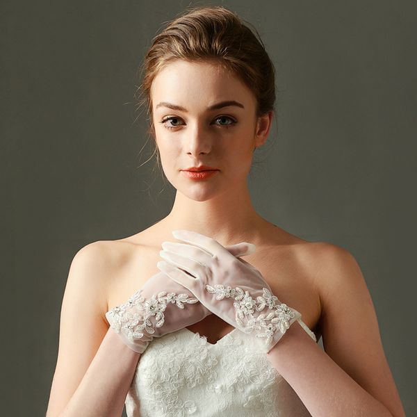 short white ivory tulle wedding gloves wrist length lace appliqued beaded woman bridal party sheer gloves guantes transparentes
short white ivory tulle wedding gloves wrist length lace appliqued beaded woman bridal party sheer gloves guantes transparentes
