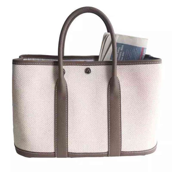 canvas cowhide large with capacity head bag new garden party casual hand one-shoulder miaoqibags color slant tote 3bue 
canvas cowhide large with capacity head bag new garden party casual hand one-shoulder miaoqibags color slant tote 3bue