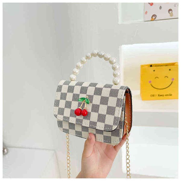 children's bag pearl portable shoulder bag foreign style lovely mini messenger zero wallet, Black
children's bag pearl portable shoulder bag foreign style lovely mini messenger zero wallet, Black