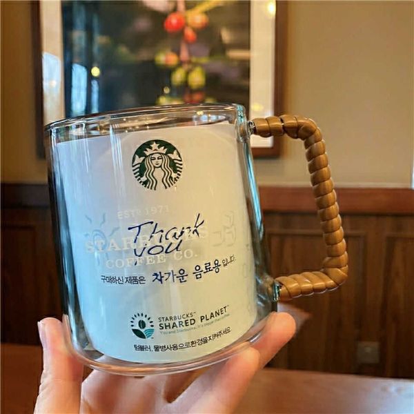south korea starbucks 2022 new rattan handle glass simple transparent large capacity milk coffee cup water cup
south korea starbucks 2022 new rattan handle glass simple transparent large capacity milk coffee cup water cup