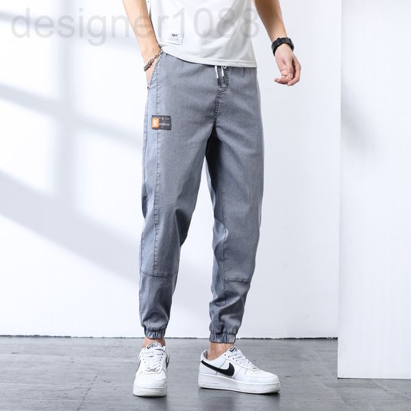 men's jeans designer loose legged denim pants men's fashion overalls summer thin boys' elastic waist nine point casual in 13f, Blue
men's jeans designer loose legged denim pants men's fashion overalls summer thin boys' elastic waist nine point casual in 13f, Blue