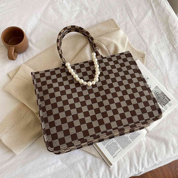 2022 factory wholesale new new high-capacity women's senior sense of foreign style autumn and winter thousand bird lattice single shoul
2022 factory wholesale new new high-capacity women's senior sense of foreign style autumn and winter thousand bird lattice single shoul
