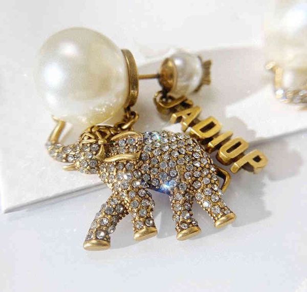 single elephant with pearl silver needle earrings female, Golden
single elephant with pearl silver needle earrings female, Golden