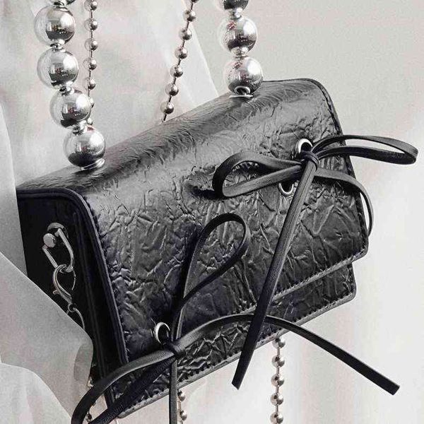 uustudio niche designer bag women's new mini bow chain mobile phone messenger bag 220613
uustudio niche designer bag women's new mini bow chain mobile phone messenger bag 220613