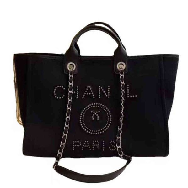 luxury classic brand beach bags canvas pearl evening bag designer portable shopping large capacity handbag women handbags label backpack lad
luxury classic brand beach bags canvas pearl evening bag designer portable shopping large capacity handbag women handbags label backpack lad