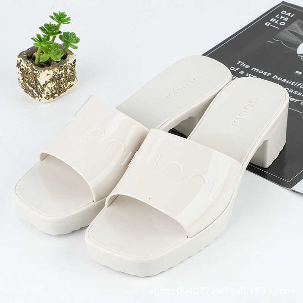 thick high-heeled soled slippers women's summer square head heel one line sandals g family candy jelly g sandals 77, Black
thick high-heeled soled slippers women's summer square head heel one line sandals g family candy jelly g sandals 77, Black