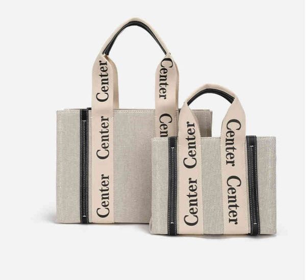 2022 new letter canvas large capacity stripe shoulder women's bag 2022 brand luxury fashion design ladies handbags
2022 new letter canvas large capacity stripe shoulder women's bag 2022 brand luxury fashion design ladies handbags