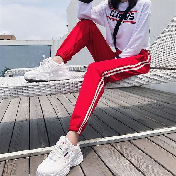 jogger spring summer sweatpants for women female sweatpants double striped haren pants bottoms sportswear trousers y200114, Black;white
jogger spring summer sweatpants for women female sweatpants double striped haren pants bottoms sportswear trousers y200114, Black;white