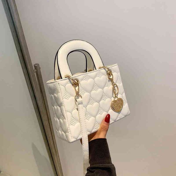 embroidered thread handbag female 2022 fashion style bag versatile high-grade texture one shoulder small square bag
embroidered thread handbag female 2022 fashion style bag versatile high-grade texture one shoulder small square bag