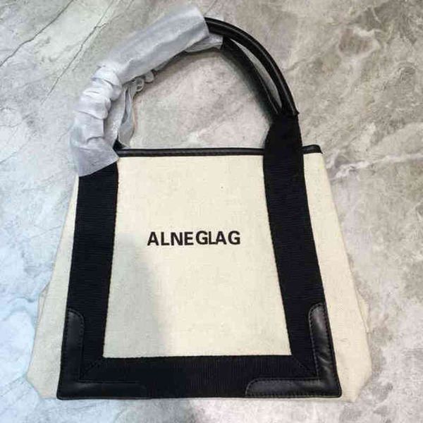 tote canvas bag with cowhide black wrist purse carried by hand slung a small bag it feels good has large capacity handbags
tote canvas bag with cowhide black wrist purse carried by hand slung a small bag it feels good has large capacity handbags