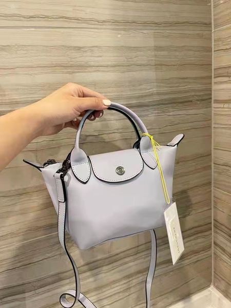 handbag size: 18*16cm this year's latest limited edition "pig bag" is a high-quality and high-version soft cowhide portable m
handbag size: 18*16cm this year's latest limited edition "pig bag" is a high-quality and high-version soft cowhide portable m
