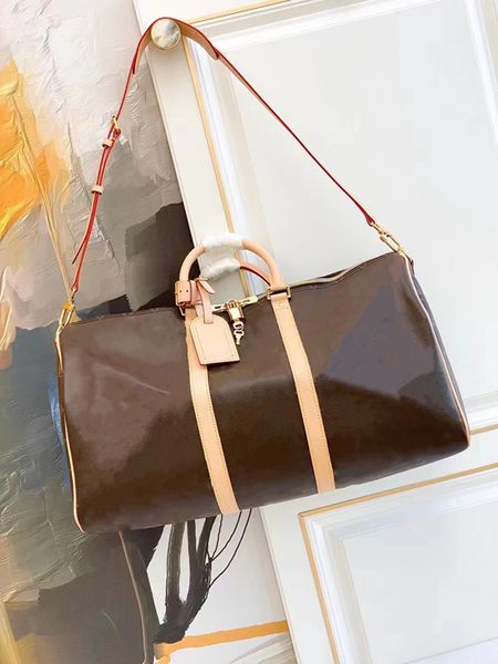 designers duffel bags 45cm 50cm 55cm luxury large capacity travel sale women men genuine leather shoulder fashion bag carry rivets with lock
designers duffel bags 45cm 50cm 55cm luxury large capacity travel sale women men genuine leather shoulder fashion bag carry rivets with lock