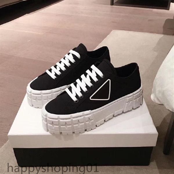 rubber platform inspired by motocross tires defines the unusual of these nylon gabardine sneakers. the logo triangle decorate50 mm2319, Black
rubber platform inspired by motocross tires defines the unusual of these nylon gabardine sneakers. the logo triangle decorate50 mm2319, Black
