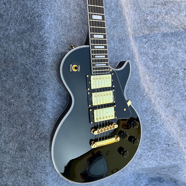 classic black beauty electric guitar, quality gold accessories, mahogany body, delivery to home
classic black beauty electric guitar, quality gold accessories, mahogany body, delivery to home