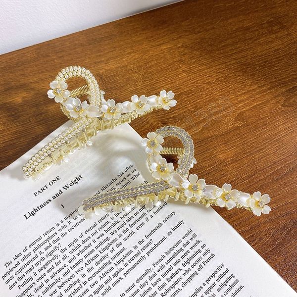 korea headwear golden flower hair claw orchid of the bell back head clip hair ornament for women headdress, Slivery;white
korea headwear golden flower hair claw orchid of the bell back head clip hair ornament for women headdress, Slivery;white