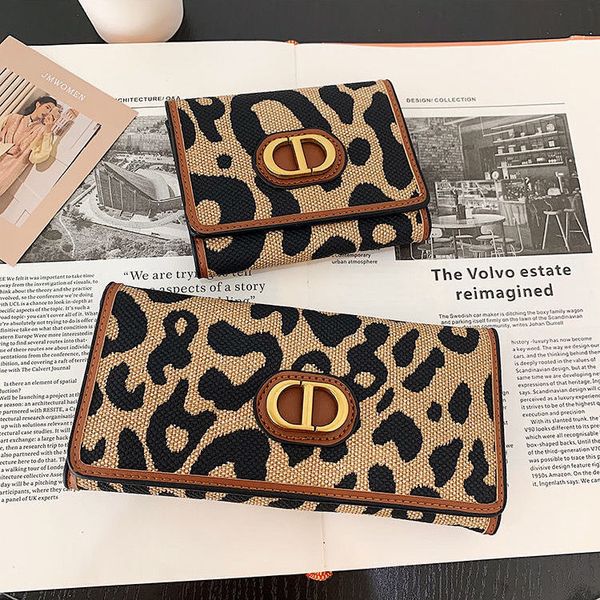 designer cd wallet card mens autumn winter new women's leather long three fold wallet hand bag large capacity leopard print fashion ret, Red;black
designer cd wallet card mens autumn winter new women's leather long three fold wallet hand bag large capacity leopard print fashion ret, Red;black