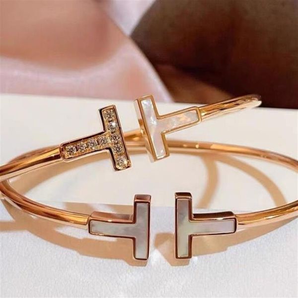 18k gold open white shell bracelets elasticity inlay rhinestone double t bracelet hand jewelry wedding women's gift214h, Golden;silver
18k gold open white shell bracelets elasticity inlay rhinestone double t bracelet hand jewelry wedding women's gift214h, Golden;silver