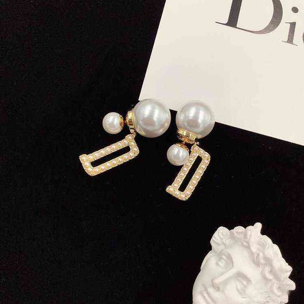 fine new classic letter pearl earrings female star front and rear pearl earrings, Golden
fine new classic letter pearl earrings female star front and rear pearl earrings, Golden