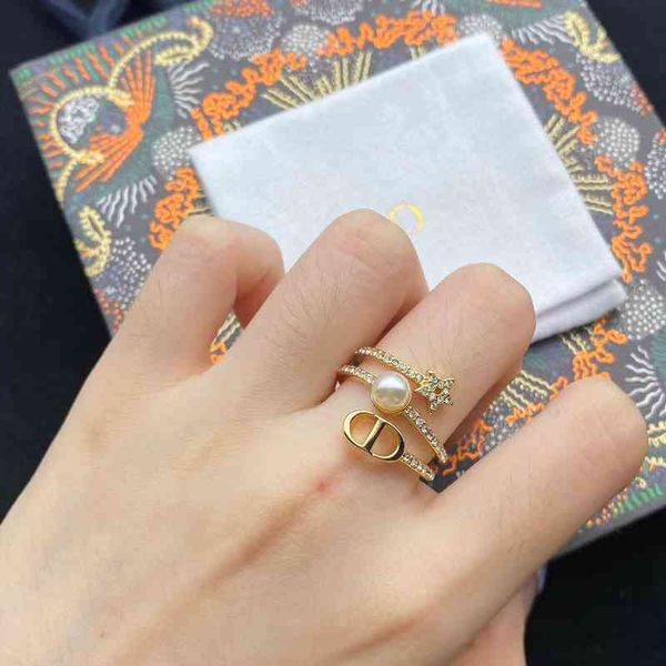 new fashion ring female net red same hollow inlaid rhinestone pearl ring jewelry, Silver
new fashion ring female net red same hollow inlaid rhinestone pearl ring jewelry, Silver