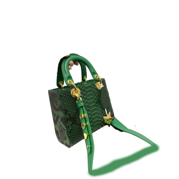princess di bags good lucky green alligator designer ms. luxurious is carrying a single shoulder bag in canine patterned fabric
princess di bags good lucky green alligator designer ms. luxurious is carrying a single shoulder bag in canine patterned fabric