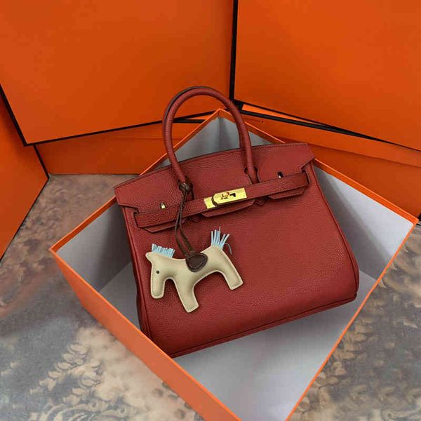 women luxury handbags 25 30 35cm tote bag handbag shoulder bags togo grain genuine leather purse with stamped lock hand horse p462
women luxury handbags 25 30 35cm tote bag handbag shoulder bags togo grain genuine leather purse with stamped lock hand horse p462