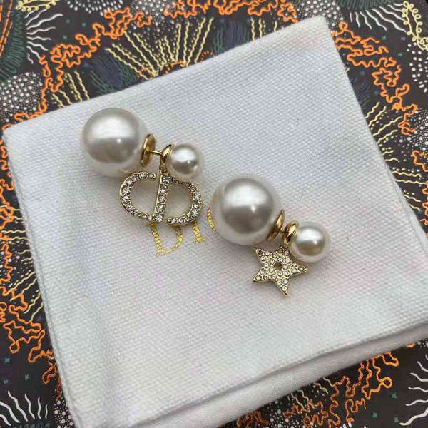 2022 factory wholesale new dijia star with diamond size pearl irregular earrings 925 silver needle, Golden
2022 factory wholesale new dijia star with diamond size pearl irregular earrings 925 silver needle, Golden