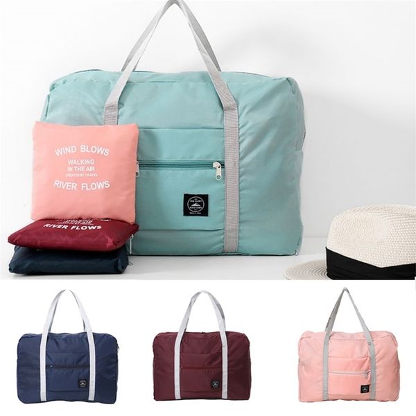 waterproof folding portable handbags men and women fashion duffle travel lage storage bags 220713
waterproof folding portable handbags men and women fashion duffle travel lage storage bags 220713