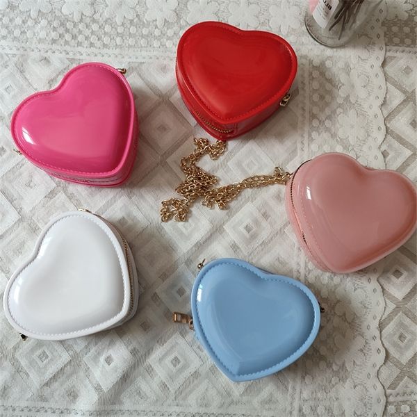 womens purses and handbags candy color pvc crossbody bags for women small coin bag ladies heart jelly purse 220602
womens purses and handbags candy color pvc crossbody bags for women small coin bag ladies heart jelly purse 220602
