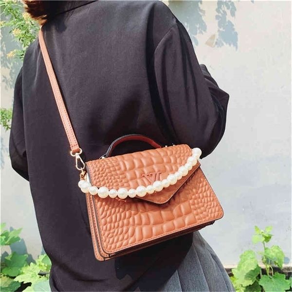 super low selling female version portable pearl flap foreign style single shoulder bag diagonal large capacity backpack 75% purses stores sa
super low selling female version portable pearl flap foreign style single shoulder bag diagonal large capacity backpack 75% purses stores sa
