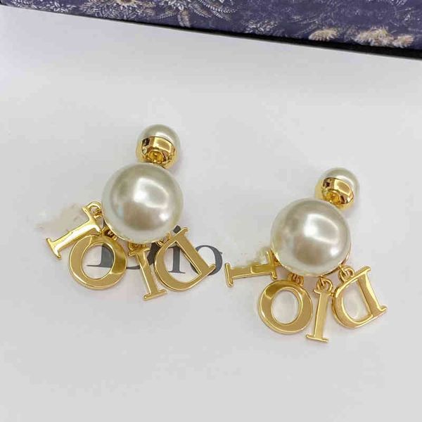 circle letter tassel pearl earrings female high sense hollow out earrings us design jewelry, Golden
circle letter tassel pearl earrings female high sense hollow out earrings us design jewelry, Golden