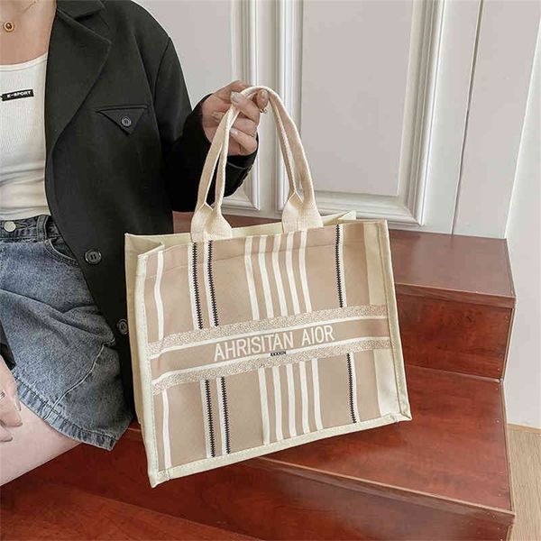 portable canvas women's summer new high-capacity one tote simple literary one design purses online
portable canvas women's summer new high-capacity one tote simple literary one design purses online